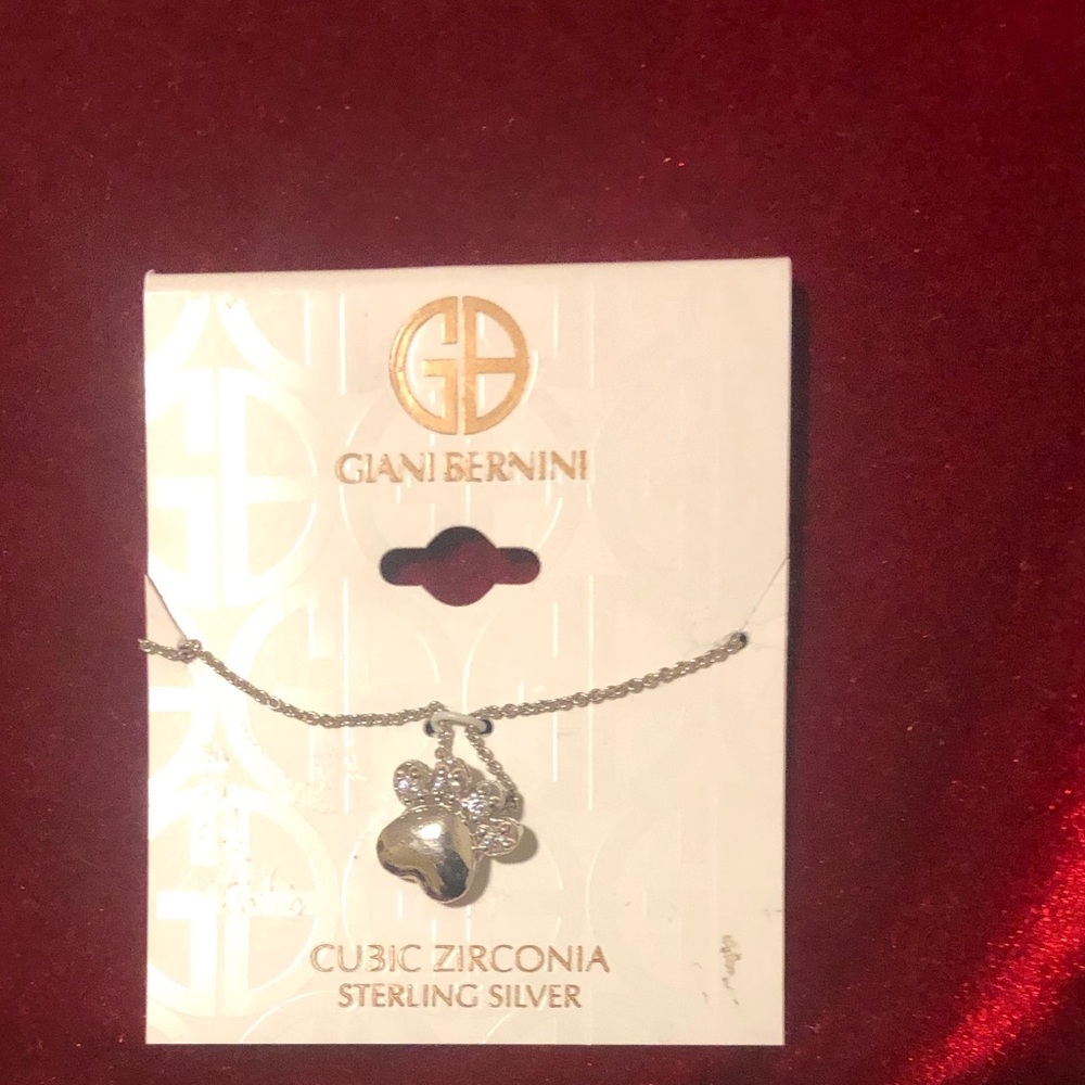 Sterling Silver cubic zirconia pendant( dog paw)